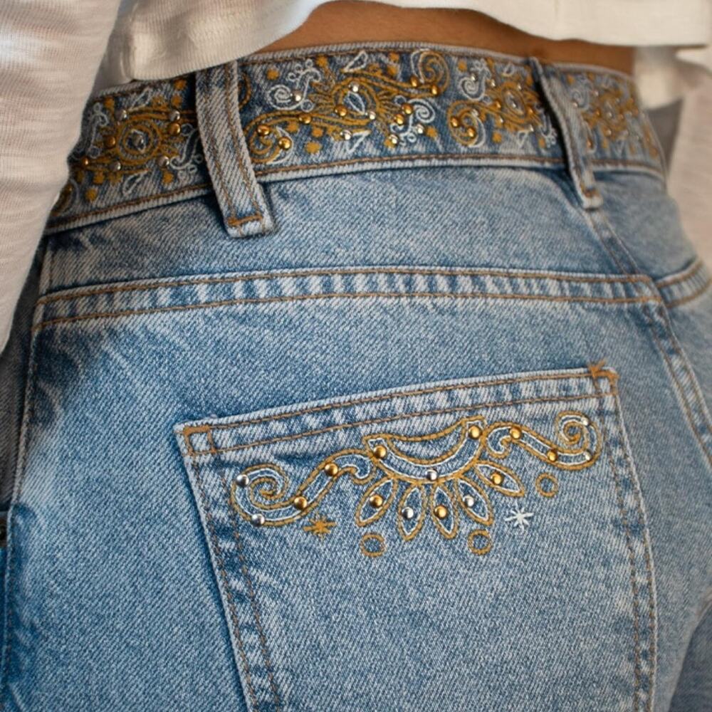 Wide leg jeans with embroidery and studs